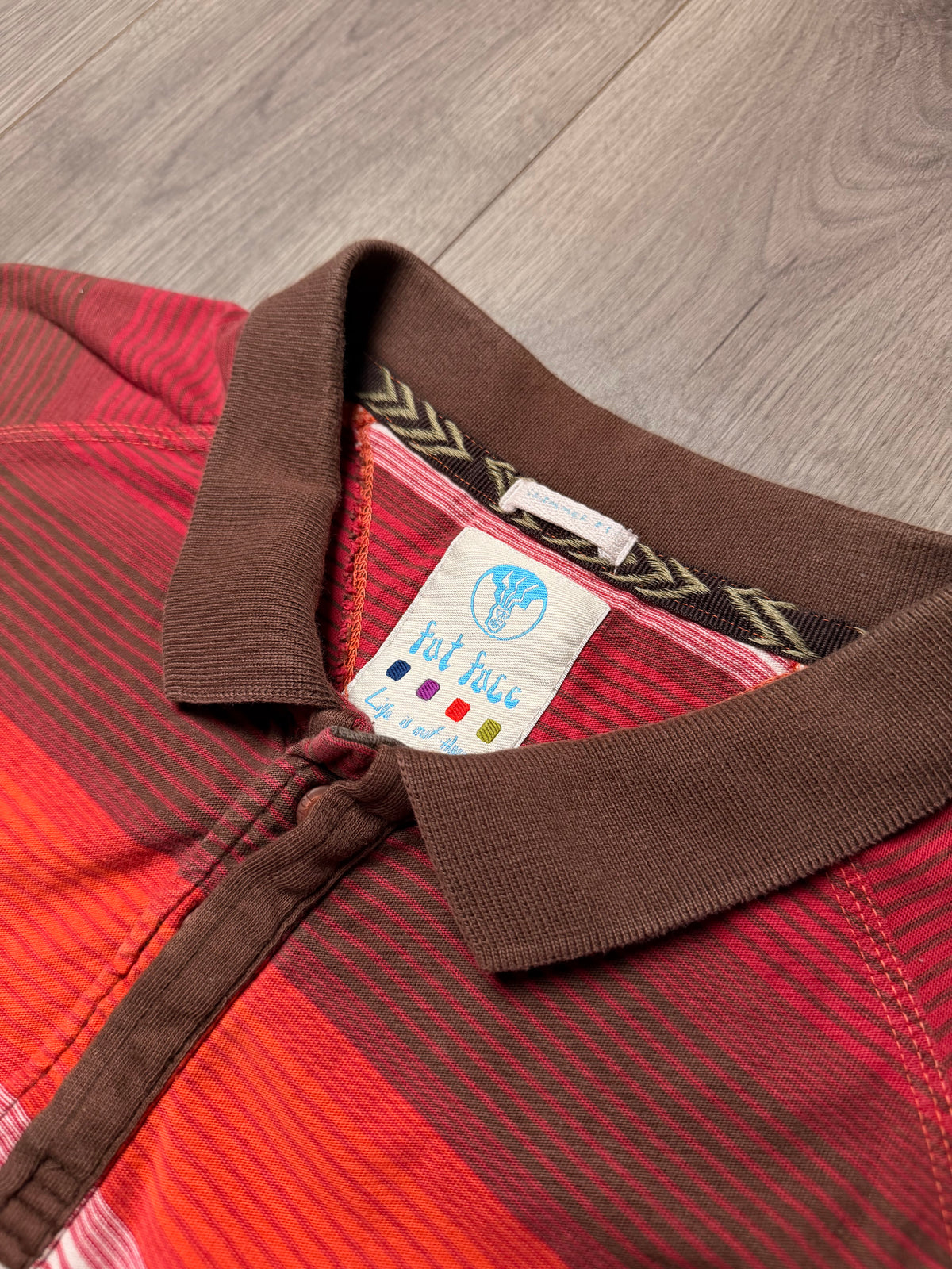 brown/orange striped fat face polo